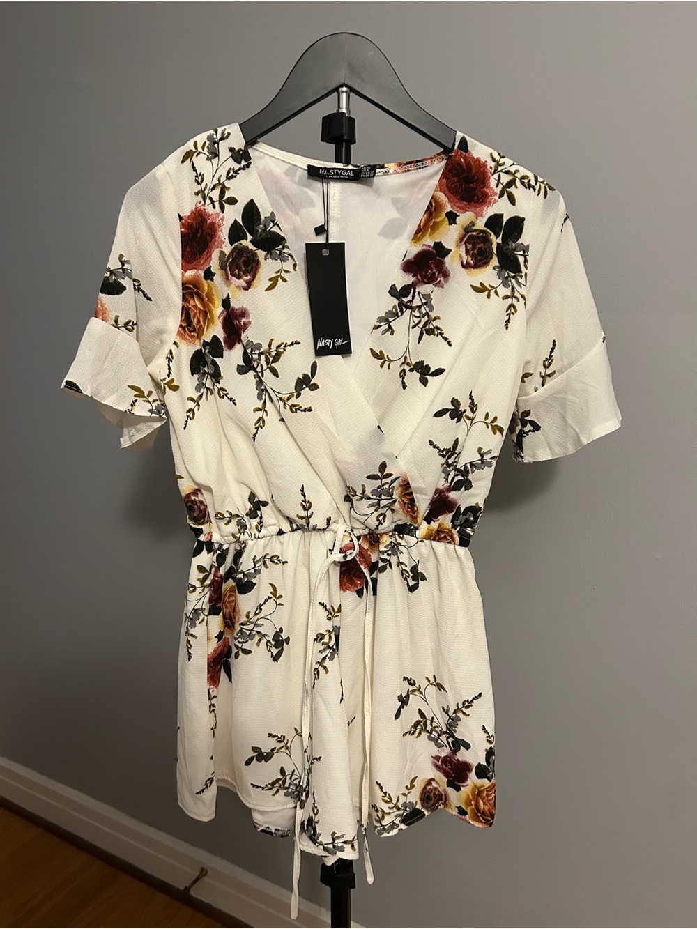 Nasty Gal White Floral Romper with Rust Blooms. New with tags!